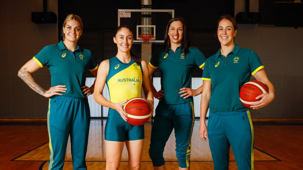 Cayla George, Katie Ebzery, Marianna Tolo and Jenna O’Hea pose during the Australian women’s basketball squad announcement on Wednesday.
