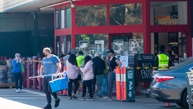 Shoppers collect last-minute items from a Bunnings store in Ashfield on Sunday morning.