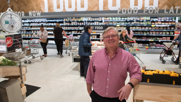 Coles managing director Steven Cain. says customers will have to pay more for buying online.