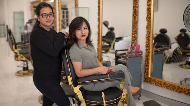 Bella O'Keefe, manager of Bella Hair & Laser (seated), with employee Sarmila Dallakoti.