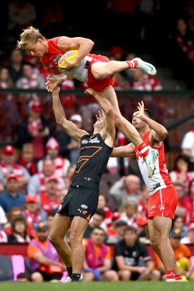 Sydney’s Isaac Heeney takes a spectacular mark against GWS.