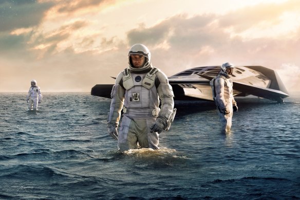 Anne Hathaway, Matthew McConaughey and Wes Bentley explore another planet in Interstellar.