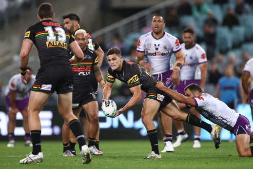 The halfback tries to sneak a pass away.