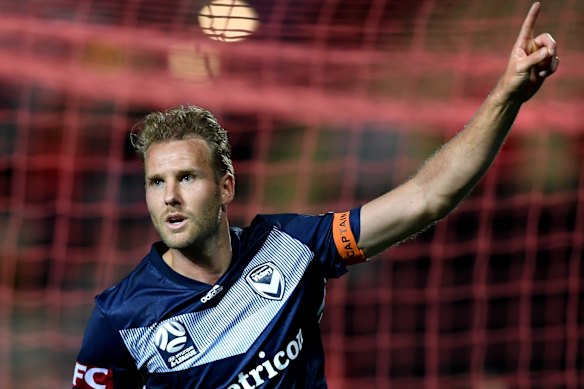 Victory's Ola Toivonen celebrates after scoring Melbourne's first goal against Adelaide. 