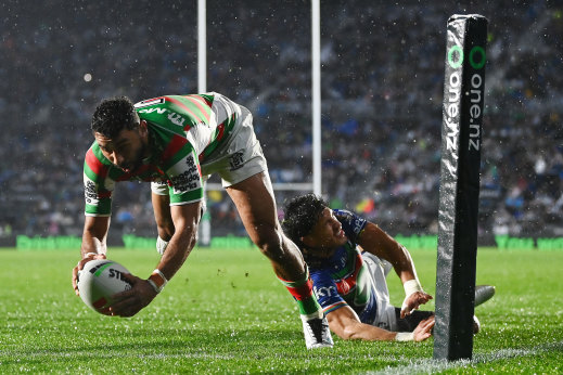 Alex Johnston beats Dallin Watene-Zelezniak to score on Friday night.