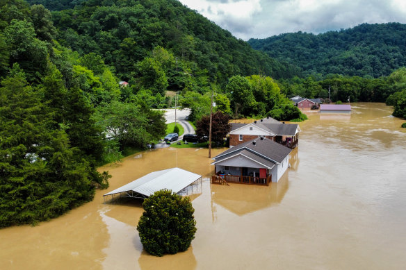 Muddy water from a nearby river seeps into homes in Jackson, Kentucky.