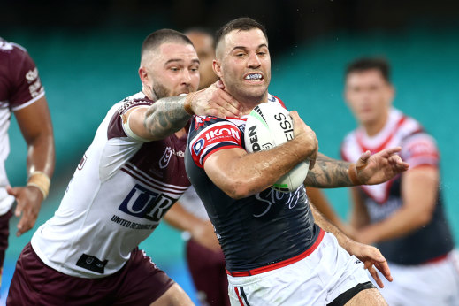 James Tedesco attempts to give Curtis Sironen the slip on Saturday.