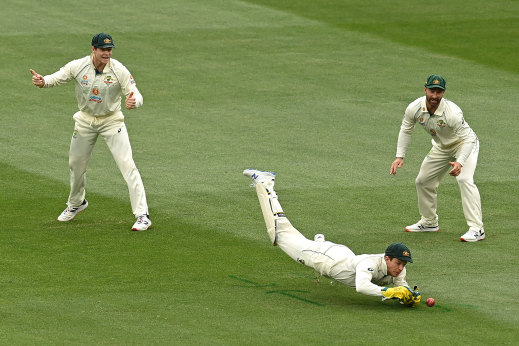 One that got away: Captain Tim Paine spills a chance during a frustrating day for the Australian team.