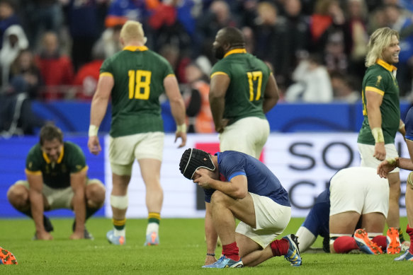 Antoine Dupont drops to the floor after his side’s loss.