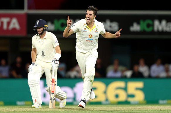 Cummins celebrates a wicket. 