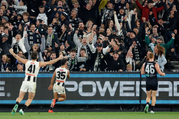Nick Daicos of the Collingwood Magpies celebrates a goal during the round 8 match against the Carlton Blues.