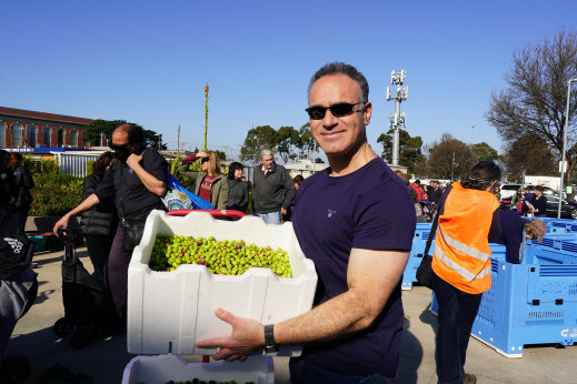 Vince LoMoro with some of the olives he picked with his mother, Concetta.