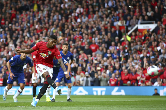 Manchester United's Marcus Rashford scores from the spot against Chelsea at Old Trafford on Sunday.