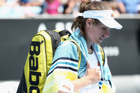 Johanna Konta leaves the court after her first-round loss to Ons Jabeur.