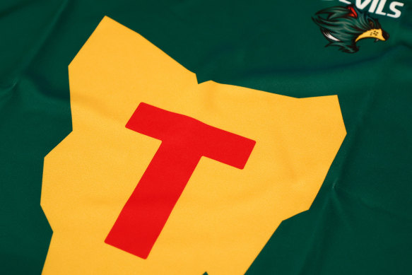 The Tasmania Devils’ inaugural jumper looks like an Aldi version of a VB can.