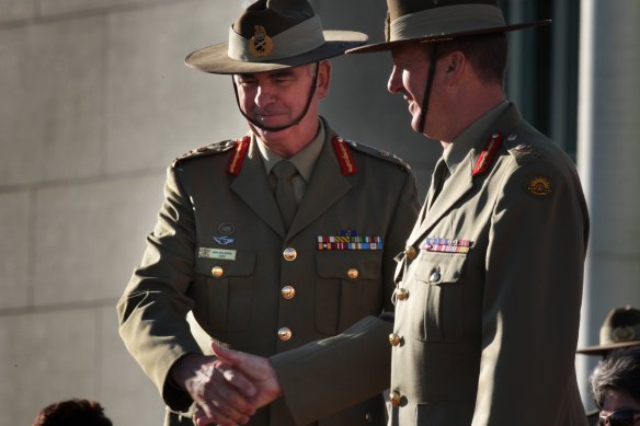 Chief of Army Lieutenant General Peter Leahy (right) is farewelled from service in 2008.