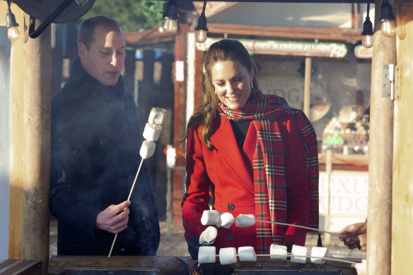Britain’s Prince William and Catherine, Princess of Wales toast larger marshmallows at Cardiff Castle in 2020.