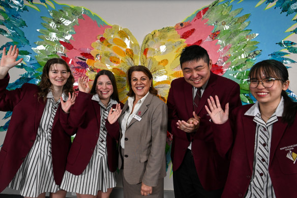 South Oakleigh College principal Helen Koziaris with year 12 students Charlotte Syer, Cayla Kingsley, Yi Wei (David) Mao and Nguyen Anh Ngan (Tris) Phan. 