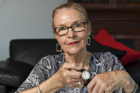 Jan McDonald with a watch she gave to her son, Guy Wettenhall, who was murdered in 1992.