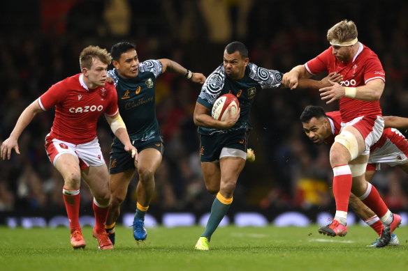 Australia full back Kurtley Beale makes a break.