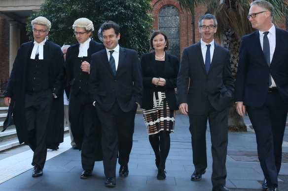 Sandy Dawson, second from left, going into court with the Herald’s Kate McClymont and her fellow investigative journalist Linton Besser, former editor Darren Goodsir and former state political editor Sean Nicholls.