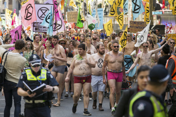 Spring rebellion: Activists stripped to their underwear and marched through the streets of Melboune last weekend.