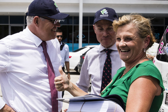 Prime Minister Scott Morrison and the member for Bowman Andrew Laming campaigning in Cleveland in 2019. 
