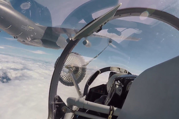 Air force and naval aviation corps of the Eastern Theatre Command of the Chinese People’s Liberation Army (PLA) conduct aerial refuelling at an unspecified location.