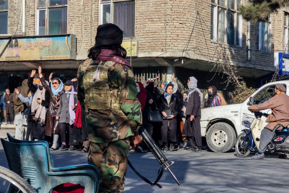 Afghan women protest against a Taliban ban on women accessing universities earlier this month.