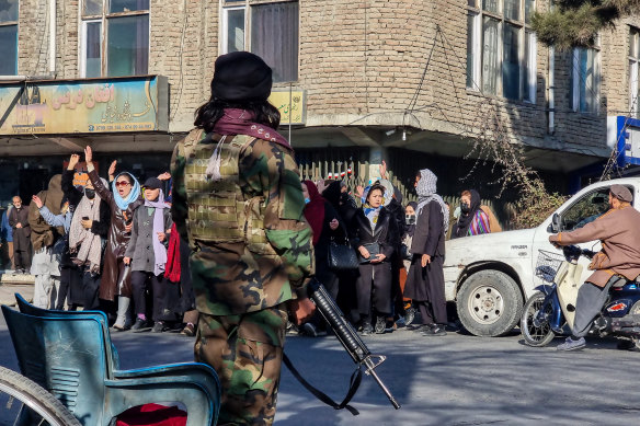 Afghan women protest against a Taliban ban on women accessing universities earlier this month.