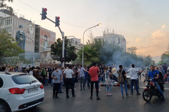 People gather in protest against the death of Mahsa Amini in Tehran.