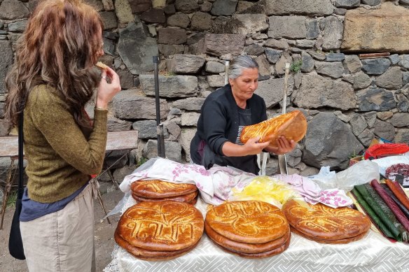 Breaking bread with the locals in Armenia on a Bunnik Tour.