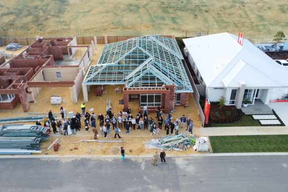 Dozens of BGC clients protesting in front of four BGC display homes under construction. 