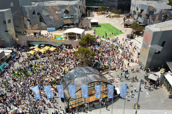 Crowds gather in Federation Square on Sunday to support the people of Ukraine.