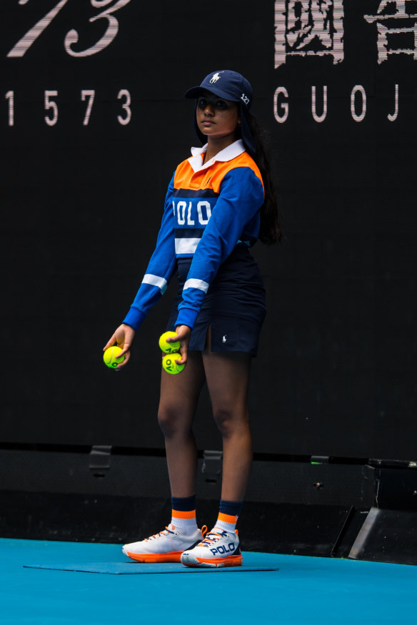 A ballgirl at the 2022 Australian Open in Ralph Lauren.