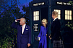 King Charles III and Queen Camilla walk out of the TARDIS during the opening ceremony ahead of the Glasgow 2026 Commonwealth Games at The Hydro on July 23, 2026 in Glasgow, Scotland.
