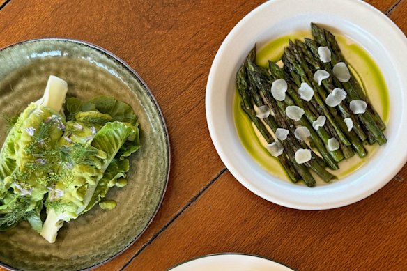 Goddess-brined cos with flowers and pickles; asparagus with white asparagus velouté and lovage oil.