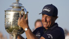 Phil Mickelson holds the Wanamaker Trophy after winning the 2021 PGA Championship.