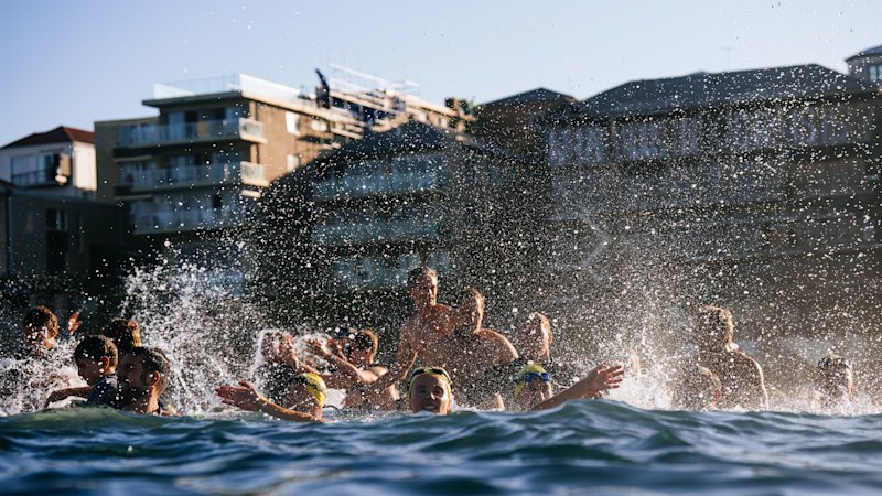 ‘Splash the water and scream’: The Bondi Beach paddle-out ceremony marks healing of community