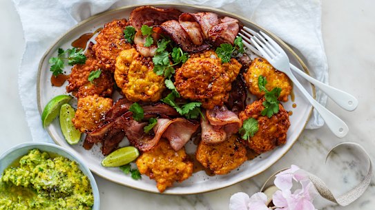 Sweetcorn cakes with maple syrup and bacon.