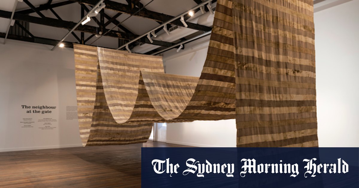 You’ve seen flags for this art show all over Sydney. But why?