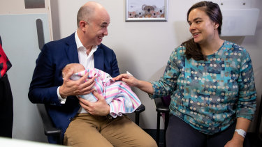 Treasurer Matt Kean speaks with new mother Natascha Flowers at the Royal Hospital for Women on Sunday.