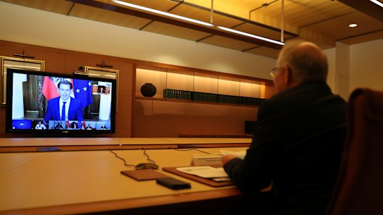 Prime Minister Scott Morrison speaks with Austrian Chancellor Sebastian Kurz during a meeting of the First Movers group.