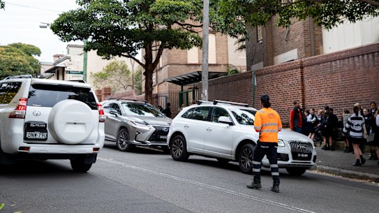 SCEGGS Darlinghurst employs a traffic warden to monitor parents picking up children.