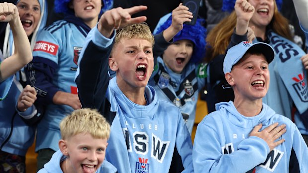 BRISBANE, AUSTRALIA - MAY 28: Blues fans cheer ahead of game one of the Men’s State of Origin series between Queensland Maroons and New South Wales Blues at Suncorp Stadium on May 28, 2025 in Brisbane, Australia. (Photo by Chris Hyde/Getty Images)