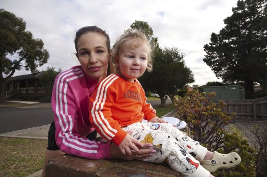 Nicole Ferraris poses and her son Sascha know the disruption of a childcare centre closing down.