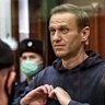 Alexei Navalny stands in the defendants’ cage during a hearing into his 2014 criminal conviction in Moscow. 