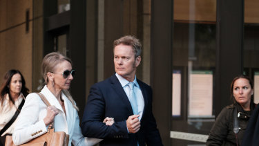 Craig McLachlan arrives at court on Wednesday with his partner Vanessa Scammell.