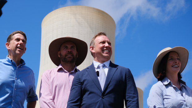 Then-premier Steven Miles (centre) at the Stanwell power station during last year’s election campaign.
