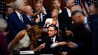 Republican members of Congress reach to shake hands with Speaker of the House Mike Johnson.